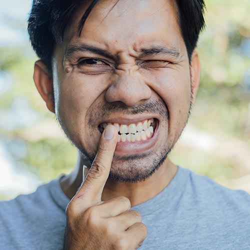 man in dental emergency