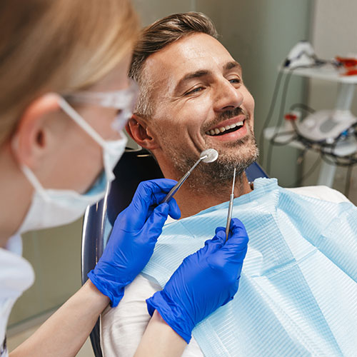 man in dentists chair